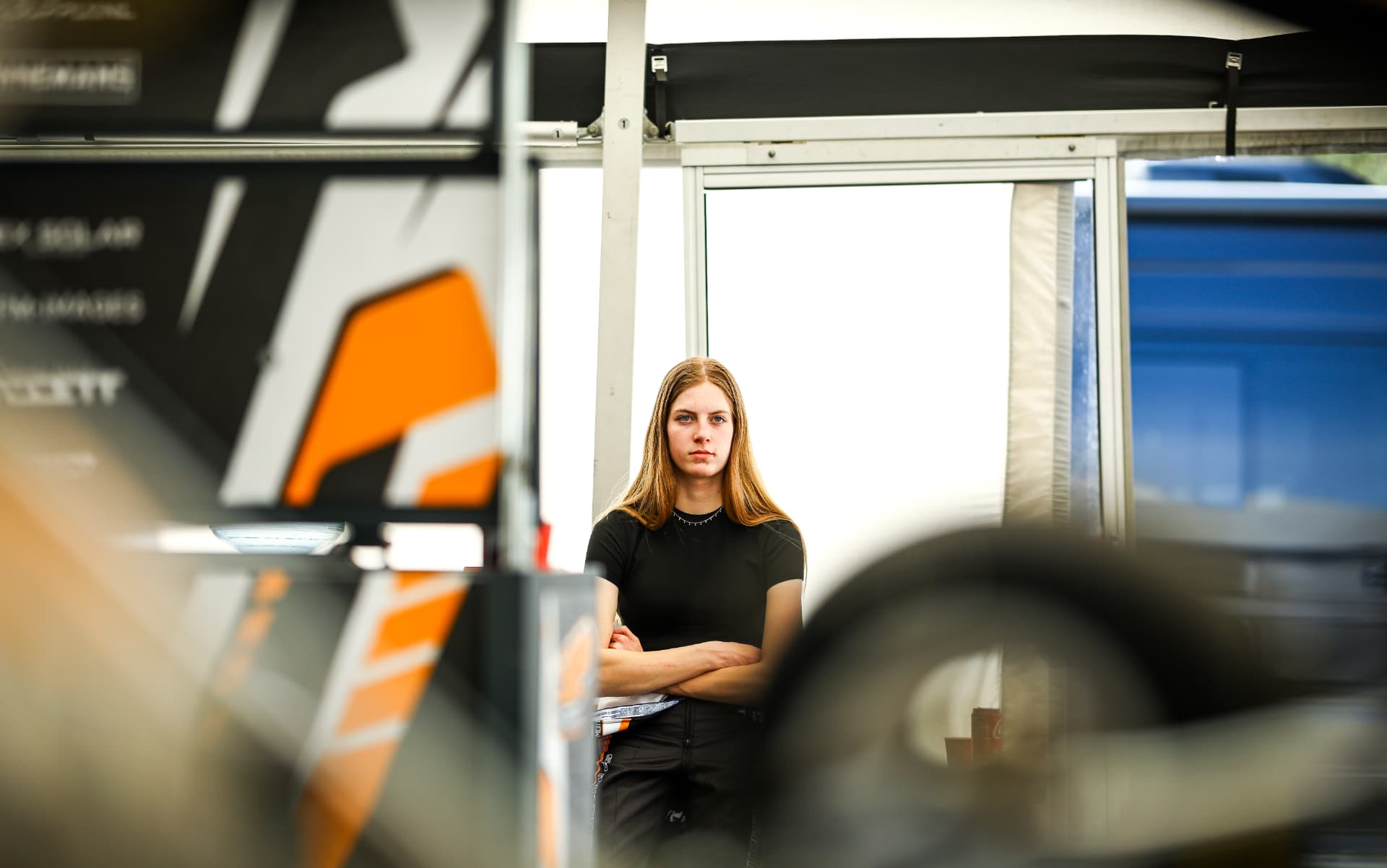 Lieke van Boekel looking into the camera under the team awning